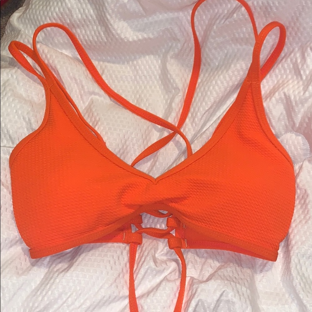 Neon orange swimsuit